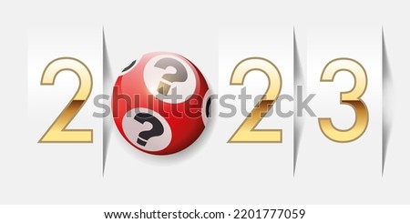 The year 2023 on the concept of luck at gambling and the hope of getting rich, with a lotto ball to symbolize chance.