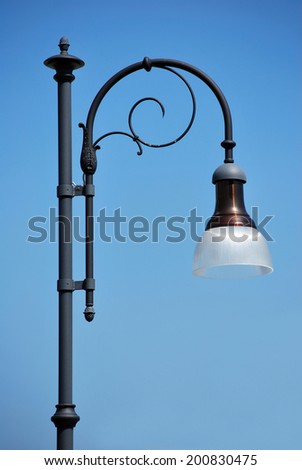 Street lamp in wrought iron ornamental