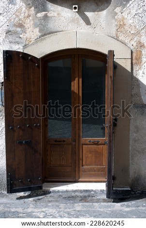 double door with wood and glass