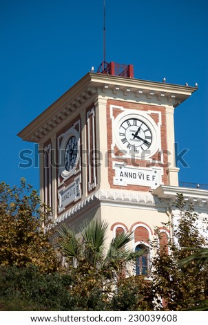 Architecture tower with clock roman numerals, Salerno Italy