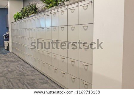 Row of white office filing cabinets Сток-фото © 