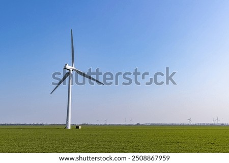 Similar – Image, Stock Photo huge wind turbine from frog perspective in front of blue sky