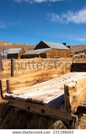 Old hay wagon in historic town of Bodie, California