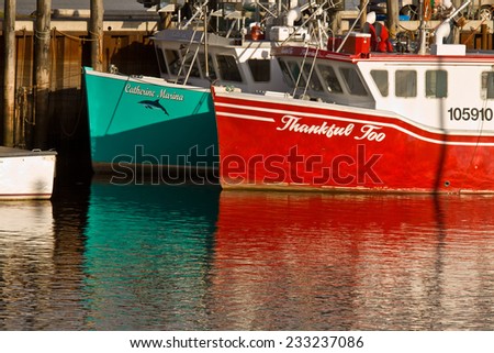 ALMA, NEW BRUNSWICK, CANADA - OCT 2009: Colorful lobster boats in the village of Alma, New Brunswick, Canada