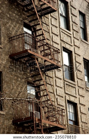 NEW YORK CITY, USA - CIRCA APRIL 2007: exterior metal fire escape on apartment building, Greenwich Village, Manhattan, New York