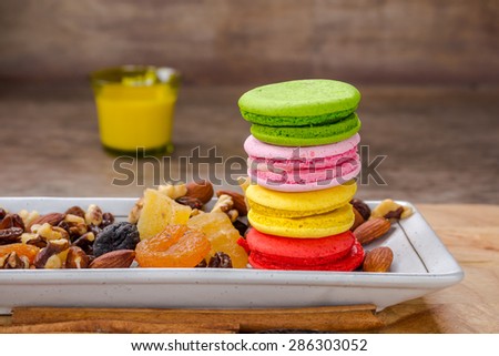 mix dried fruits and colorful macaroons