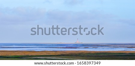 Similar – Foto Bild Leuchtturm Westerhever hinter den Dünen von St. Peter-Ording