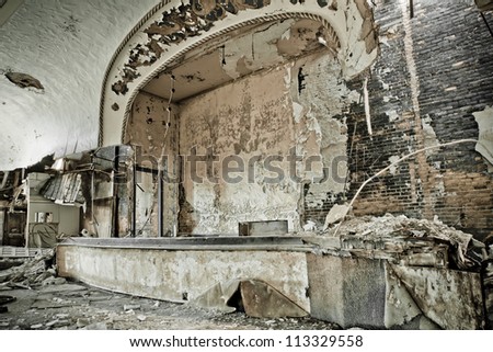 Abandoned music theater ballroom in Detroit Michigan. It has burned and it\'s once beautiful facade is crumbling away.