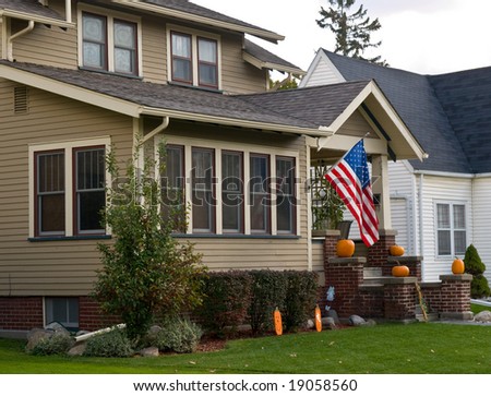 Home decorated for the Autumn holidays with pumpkins and American Flag
