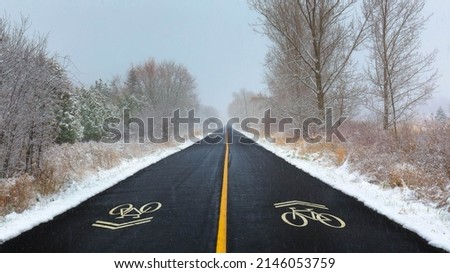 Similar – Image, Stock Photo Bike lane marks and pedestrian crossing