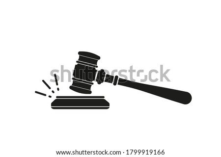 Judge's gavel. Judges gavel hammer for adjudication of sentences and bills, with a wooden stand. Law and justice concept. Wooden auction hammer