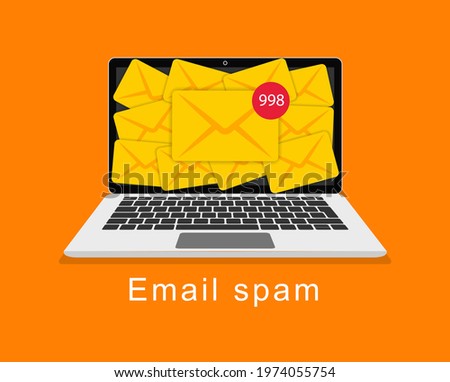 Email spam. Full email inbox of spam. Spam mailbox concept, lot of letters on the monitor screen. Laptop with a lot of envelopes on the screen, the concept of spam, mail hacking, fraud, cyber piracy.