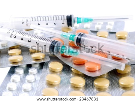 Syringes and tablets. Medical still life.