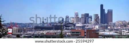 Panorama for Downtown of Seattle in foggy industrial morning.