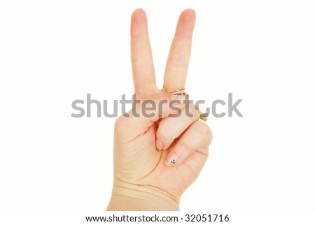 A female hand with two fingers up in the peace or victory symbol. Also the sign for the letter V in sign language. Isolated on white background.