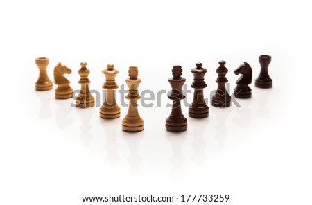 Chess pieces set on white background