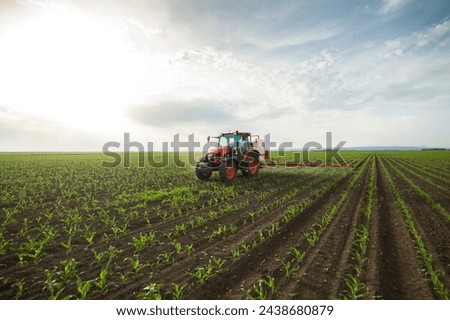 Similar – Foto Bild Traktor auf Feld in Abendsonne