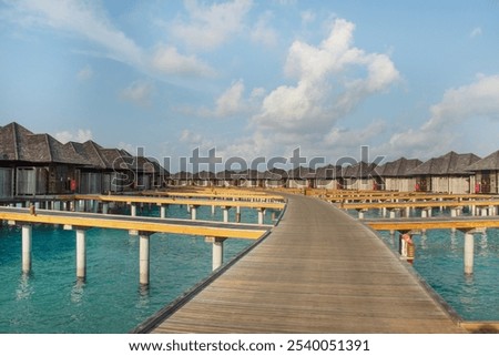 Similar – Image, Stock Photo Wooden pier on stilts on lake near mountains