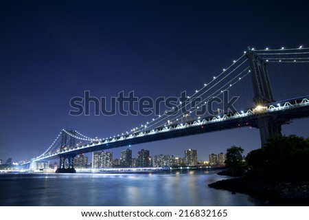 The Manhattan Bridge is a suspension bridge that crosses the East River in New York City, connecting Lower Manhattan with Brooklyn.