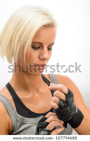Kick-box woman wear protective gloves prepare for fitness workout