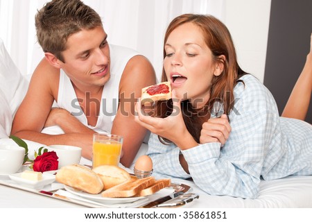 http://image.shutterstock.com/display_pic_with_logo/206023/206023,1251187283,1/stock-photo-happy-man-and-woman-having-luxury-hotel-breakfast-in-bed-together-35861851.jpg