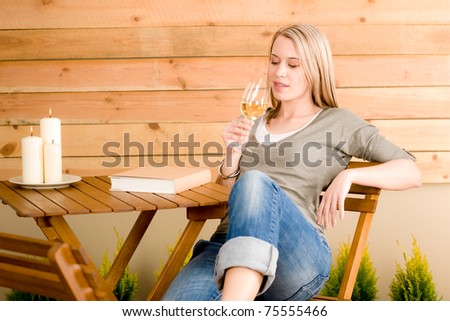 Garden happy woman enjoy wine rest patio