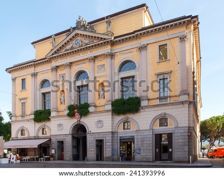 Lugano, Switzerland - september 25, 2014: City of Lugano, Switzerland. The streets of the old town between the buildings of the nineteenth century. They meet various commercial activities.