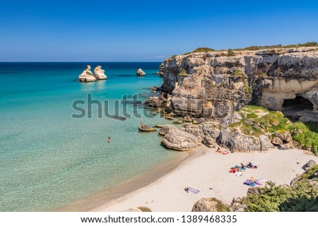 Similar – Image, Stock Photo The Two Sisters stacks in front of the shore of Torre dell’Orso