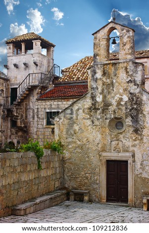 Church and Marco Polo tower in Korcula. Croatia.