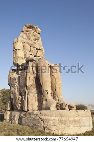 Colossi of Memnon huge statues guarding the valley of the kings Egypt
