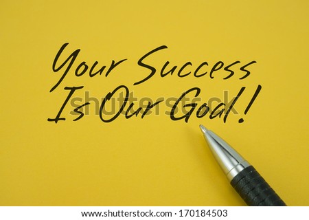 Your Success Is Our Goal note with pen on yellow background