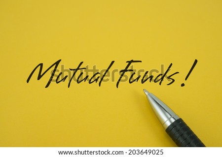 Mutual Funds! note with pen on yellow background