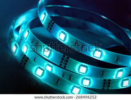 Led silicon shining blue strip in coil. Diode lights.