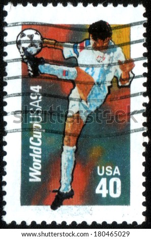 USA - CIRCA 1994:A post stamp printed in USA shows football player, devoted football world championship,USA, circa 1994.