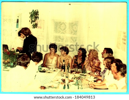 USSR, Petrapavlovsk - CIRCA 1980s: An antique photo shows wedding feast