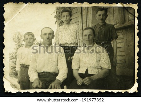 USSR - CIRCA 1953: An antique photo shows family portrait, 1953