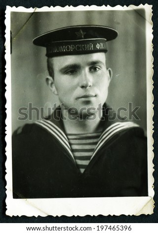 MURMANSK, USSR - CIRCA 1980: An antique photo shows portrait of a Baltic Navy submarine Midshipman in uniform.