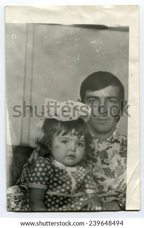 Ussr - CIRCA 1970s: An antique Black & White photo shows father and daughter