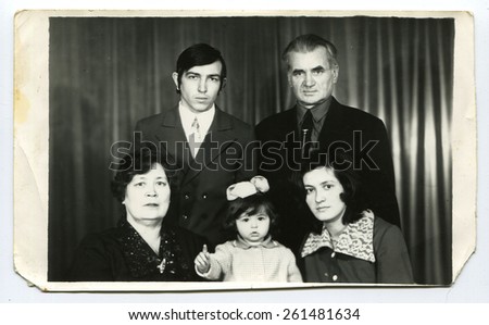 Ussr - CIRCA 1970s: An antique Black & White photo show family portrait