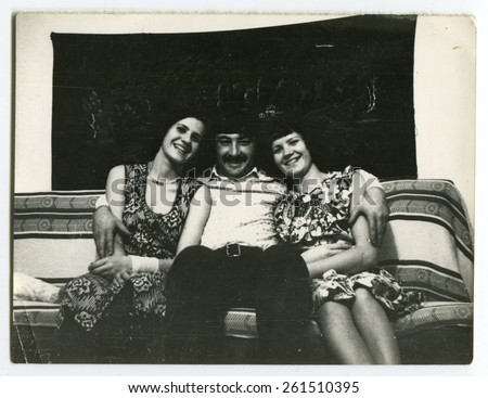 Ussr - CIRCA 1970s: An antique Black & White photo show man and two woman