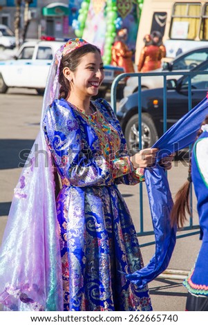 PETROPAVLOVSK, KAZAKHSTAN - MARCH 21, 2015: celebration of the new year on the solar calendar astronomical in Iranian and Turkic peoples. The girls in national dress