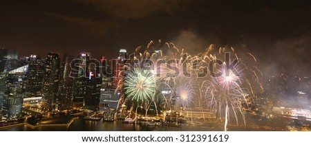 Singapore - July 25, 2015: Singapore National Day dress rehearsal fireworks shot from Marina Bay Sands Hotel.
