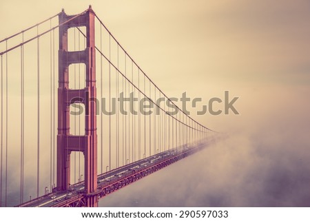 Into the Fog. San Francisco Golden Gate Bridge Foggy Scenery.