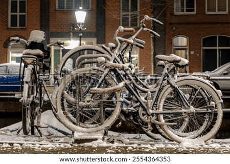 Similar – Foto Bild Fahrrad auf dunkler Straße geparkt