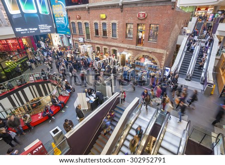 Melbourne, Australia - Aug 1, 2015: People visiting Melbourne Central, which is a complex with shopping mall, office tower and railway station. It is a popular tourist attraction in Melbourne