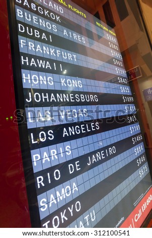Melbourne, Australia - Aug 30, 2015: Airfares on LED display board outside a travel company in Melbourne, Australia