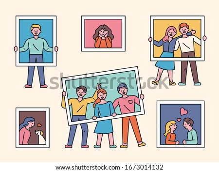 Various people are taking photos with photo frames in hand. flat design style minimal vector illustration.