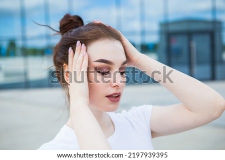 Similar – Image, Stock Photo Delighted young lady blowing confetti on street