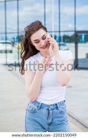 Similar – Image, Stock Photo Delighted young lady blowing confetti on street