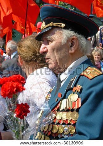 KIEV, UKRAINE - MAY 9: A war veteran at ceremonial parade at Kiev main street - Khreshchatyc - dedicated to the 64th Anniversary of victory in Great Patriotic War (World War II) May 9, 2009 in Kiev.
